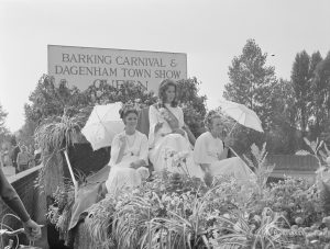 Barking Carnival 1971 from Mayesbrook Park, showing Barking Carnival and Dagenham Town Show Queen float, with the Queen and two attendants aboard, 1971