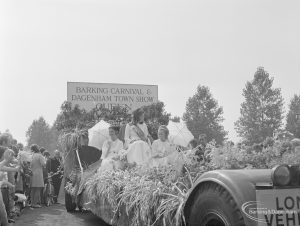 Barking Carnival 1971 from Mayesbrook Park, showing Barking Carnival and Dagenham Town Show Queen float, with the Queen and two attendants aboard, 1971