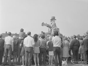 Barking Carnival 1971 from Mayesbrook Park, showing a crowd of spectators around a float from the carnival, 1971