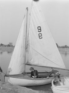 Barking Carnival 1971 from Mayesbrook Park, showing two boys in the number 9 sailing boat, 1971
