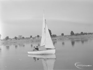 Barking Carnival 1971 from Mayesbrook Park, showing sailing boat number 9 with two boys aboard, 1971