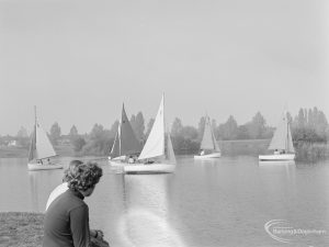 Two women watching the Sailing Regatta in Mayesbrook Park, Dagenham, 1971