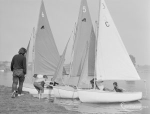 Three sailing boats by the shore, at the Sailing Regatta in Mayesbrook Park, Dagenham, 1971