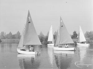 4′ and ‘5’ boats (level) passing the ‘C’ boats by island, at the Sailing Regatta in Mayesbrook Park, Dagenham, 1971