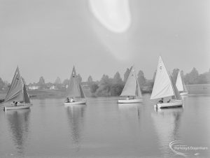 Five boats (sails not properly trimmed), at the Sailing Regatta in Mayesbrook Park, Dagenham, 1971