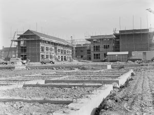 Old Dagenham Village housing development, showing foundations and new homes under construction on site south of Crown Street, 1971