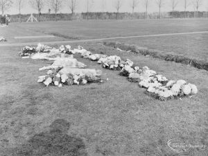 Funeral of Alderman Denis O’Dwyer KSG, showing wreaths laid out for viewing in two lines at Eastbrookend Cemetery, Dagenham, 1971