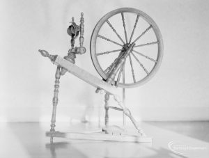 Spinning wheel (silhouette view from side), on loan from Victoria and Albert Museum and displayed in Valence House, Becontree Avenue, Dagenham, 1972
