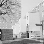 Becontree Heath housing, with white rectangular two-storey features and public footpath signpost to Trefgarne Road, 1972