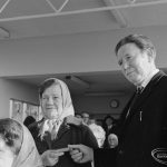 Councillor Tibble presenting Mrs Elizabeth Williams of Broad Street with her bus permit in Children’s Library at Rectory Library, Dagenham, 1972