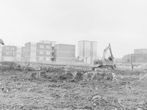 Borough Engineer’s Department clearance of site at Lindsell Road, Barking (Gascoigne 4, Stage 2), showing protruding concrete blocks and earth mover, 1972
