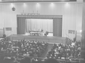 Public meeting on ‘Fair Rents’ bill at Assembly Hall, Barking, showing frontal view of stage and section of audience, 1972