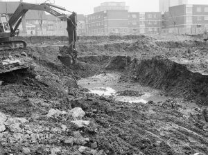 Borough Engineer’s Department clearance of site at Lindsell Road, Barking (Gascoigne 4, Stage 2), showing excavation filled with water in Hardwicke Street, 1972