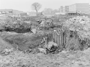 Borough Engineer’s Department clearance of site at Lindsell Road, Barking (Gascoigne 4, Stage 2), showing view towards Lindsell Road with pit in foreground, 1972