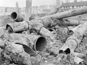Borough Engineer’s Department clearance of site at Lindsell Road, Barking (Gascoigne 4, Stage 2), showing jungle of old pipes, 1972
