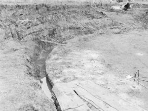Borough Engineer’s Department clearance of site at Lindsell Road, Barking (Gascoigne 4, Stage 2), showing northern rim of large circular concrete base, viewed from south-west, 1972