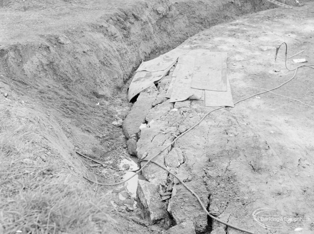 Borough Engineer’s Department clearance of site at Lindsell Road, Barking (Gascoigne 4, Stage 2), showing drills and already broken area of large circular concrete base, 1972