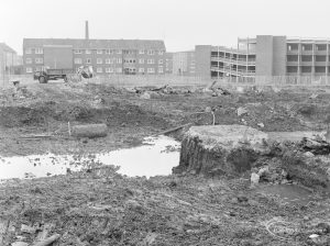 Borough Engineer’s Department clearance of site at Lindsell Road, Barking (Gascoigne 4, Stage 2), showing water and square upstanding block of masonry, 1972
