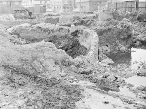 Borough Engineer’s Department clearance of site at Lindsell Road, Barking (Gascoigne 4, Stage 2), showing broken circular brick wall, 1972