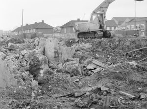 Borough Engineer’s Department clearance of site at Lindsell Road, Barking (Gascoigne 4, Stage 2), showing digger and concrete walls below ground, 1972
