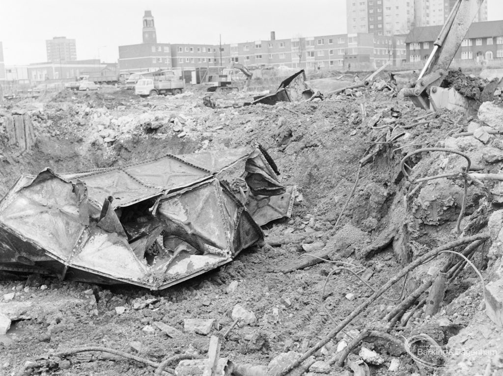 Borough Engineer’s Department clearance of site at Lindsell Road, Barking (Gascoigne 4, Stage 2), showing crushed multi-panelled tank now in pit, 1972