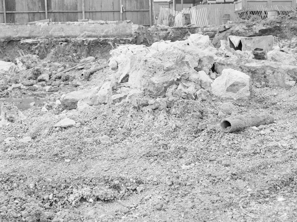 Borough Engineer’s Department clearance of site at Lindsell Road, Barking (Gascoigne 4, Stage 2), showing tanks, pipes and blocks of masonry on east side, 1972