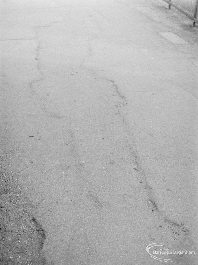 Highways accident, showing long strip of defective tarmac outside car park near the Merry Fiddlers Public House, Becontree Heath, Dagenham, 1972