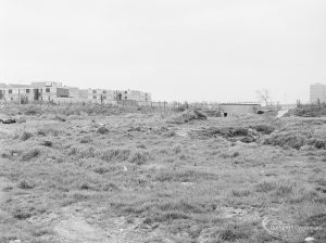 Dagenham Village housing development, showing undeveloped land adjoining east end of Ballards Road, continuing to south, with new housing on left, 1972