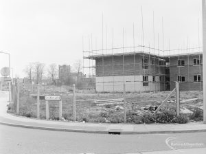 Dagenham Village housing development, showing unfinished housing in Church Lane, with St Peter and St Paul’s Parish Church in background, 1972