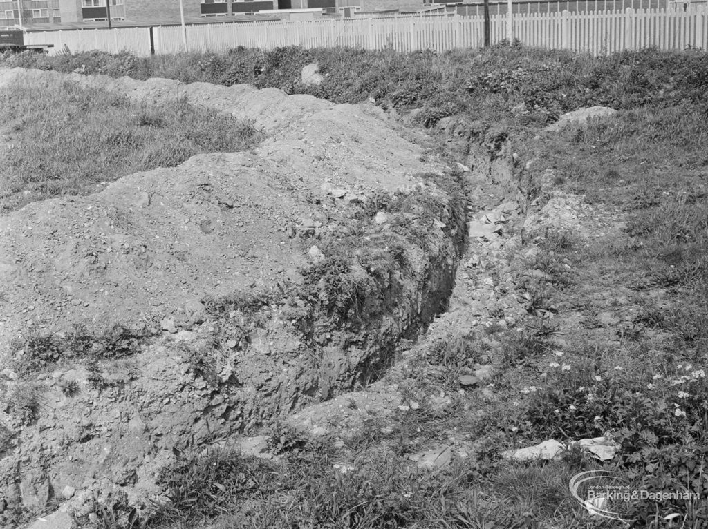 Deep trench and rampart surrounding Gypsy encampment housing at Leys Avenue, Dagenham, 1972