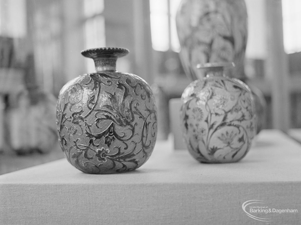 Victoria and Albert Exhibition on Martinware at Rectory Library, Dagenham, showing two flat vases with embossed patterns, 1972