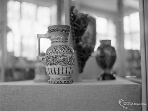 Victoria and Albert Exhibition on Martinware at Rectory Library, Dagenham, showing an ornate ewer with stripes and criss-cross design, 1972