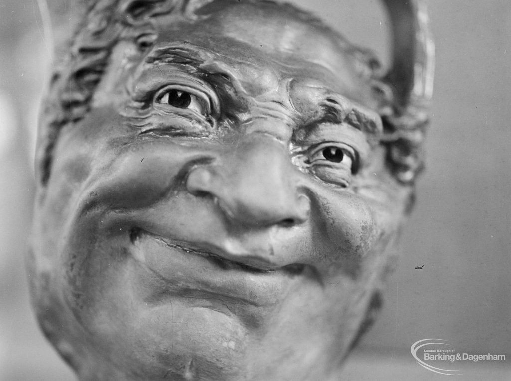 Victoria and Albert Exhibition on Martinware at Rectory Library, Dagenham, showing close-up of jug with grotesque human face, 1972