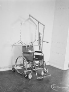 Welfare Department, taken for Social Services Dagenham Town Show display, showing empty wheelchair with equipment, 1972