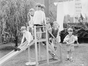 Welfare Department, taken for Social Services Dagenham Town Show display, showing children on a slide with a boy about to launch, 1972