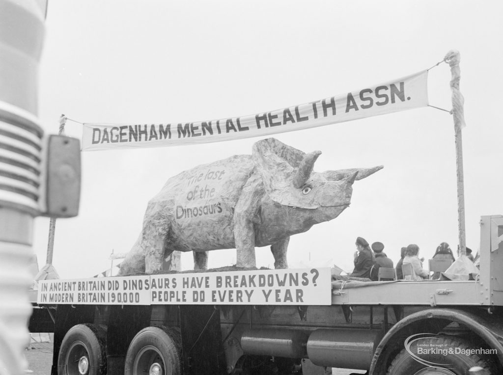 Dagenham Town Show 1972, showing Dagenham Mental Health Association carnival float with dinosaur in Old Dagenham Park, 1972
