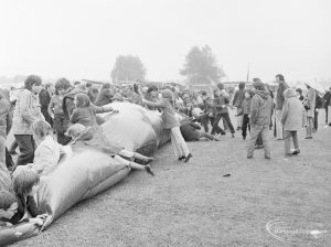 Dagenham Town Show 1972 at Central Park, Dagenham, showing long view of the giant inflated tube in rain, 1972