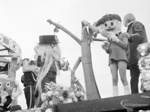 Dagenham Town Show 1972 at Central Park, Dagenham, showing tableau on float with tree and people wearing large heads, 1972