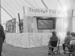 Dagenham Town Show 1972 at Central Park, Dagenham, showing Fanshawe Film Society stand with audience watching back-projection film, 1972