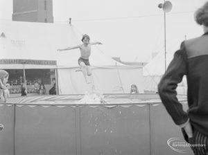 Dagenham Town Show 1972 at Central Park, Dagenham, showing child jumping into Dagenham Swimming Club pool, 1972
