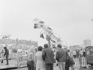 Dagenham Town Show 1972 at Central Park, Dagenham, showing visitors watching Octopus ride in fairground, 1972
