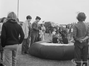 Dagenham Town Show 1972 at Central Park, Dagenham, showing boy trying to drive small hovercraft, 1972