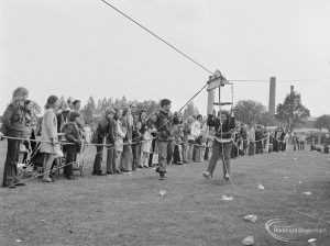 Dagenham Town Show 1972 at Central Park, Dagenham, showing passenger landing at end of Parachute Regiment zip wire, 1972