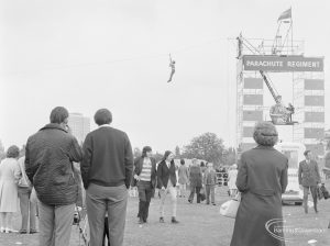Dagenham Town Show 1972 at Central Park, Dagenham, showing spectators watching descent on Parachute Regiment zip wire, 1972