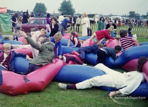 Dagenham Town Show 1972 at Central Park, Dagenham, showing children playing on intertwined inflated tubes, 1972
