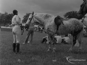 Dagenham Town Show 1973 at Central Park, Dagenham, showing Horse Trials with rider holding grey in paddock, 1973