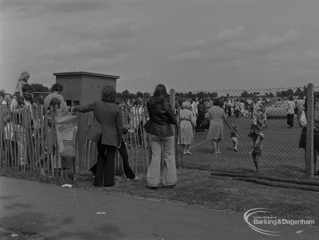 Dagenham Town Show 1973 at Central Park, Dagenham, showing box office queue of visitors at south end, opposite Fire Station, 1973