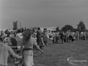 Dagenham Town Show 1973 at Central Park, Dagenham, showing parents and babies queueing for photographs to be taken, 1973