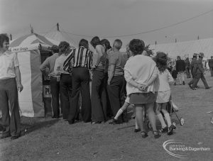 Dagenham Town Show 1973 at Central Park, Dagenham, showing visitors queueing for hot dogs, with tents beyond, 1973