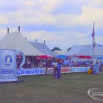 Dagenham Town Show 1973 at Central Park, Dagenham, showing Beer Marquee with visitors sitting and drinking, and large ‘Whitbread Tankard’ and other signs, 1973